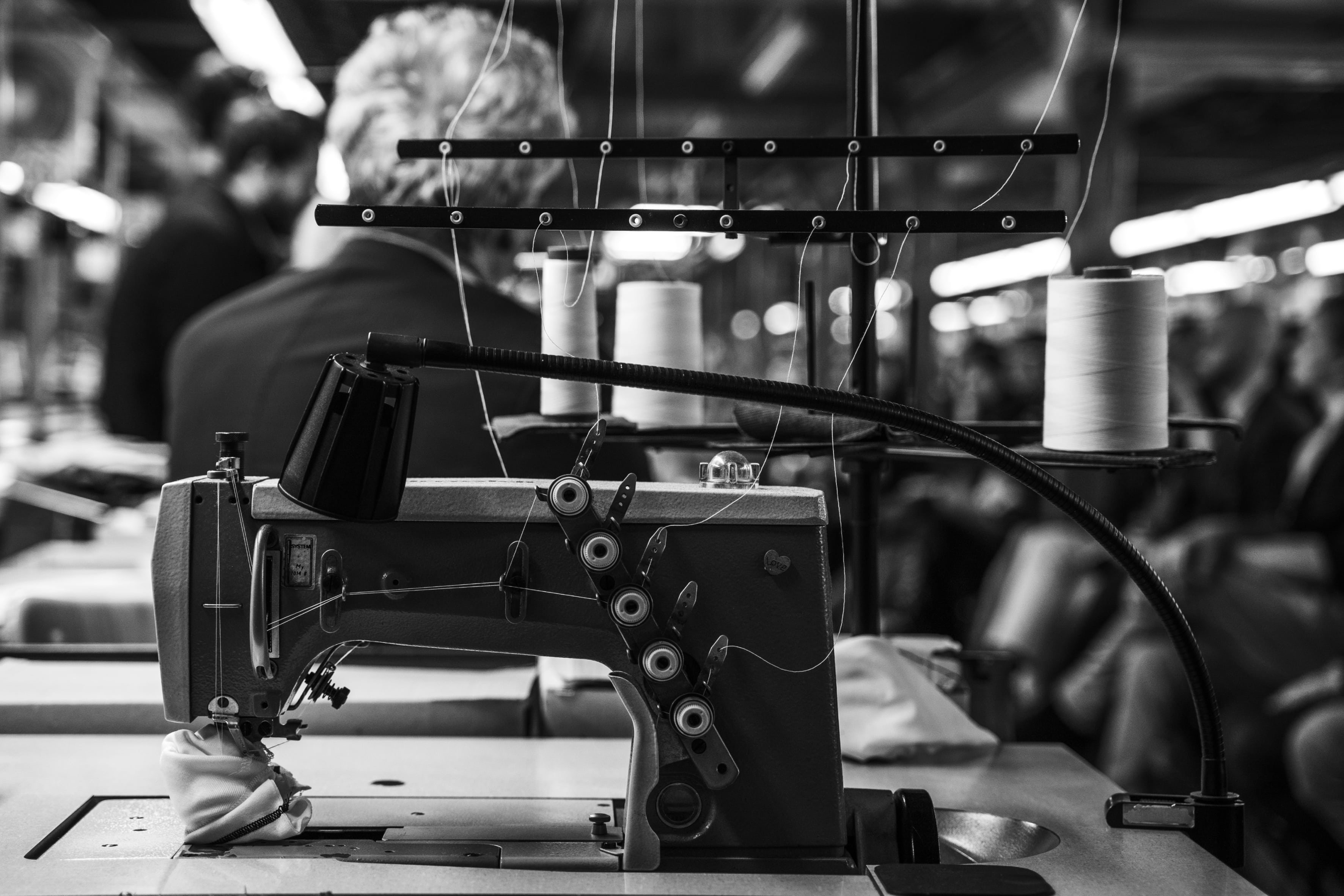 Black and white photo of a sewing machine